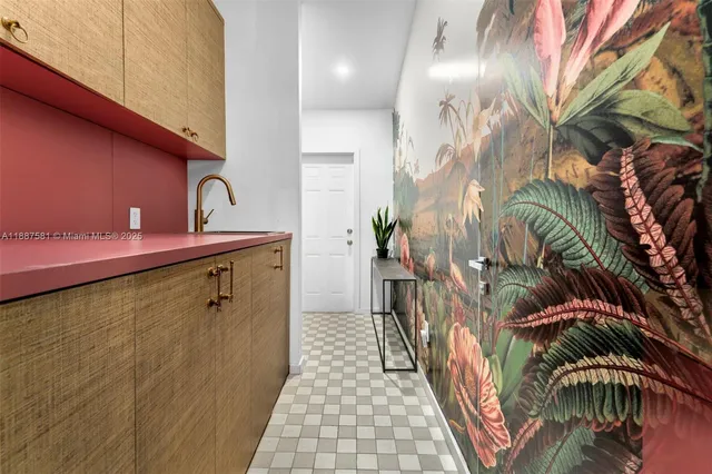 a view of a park with plants and large trees