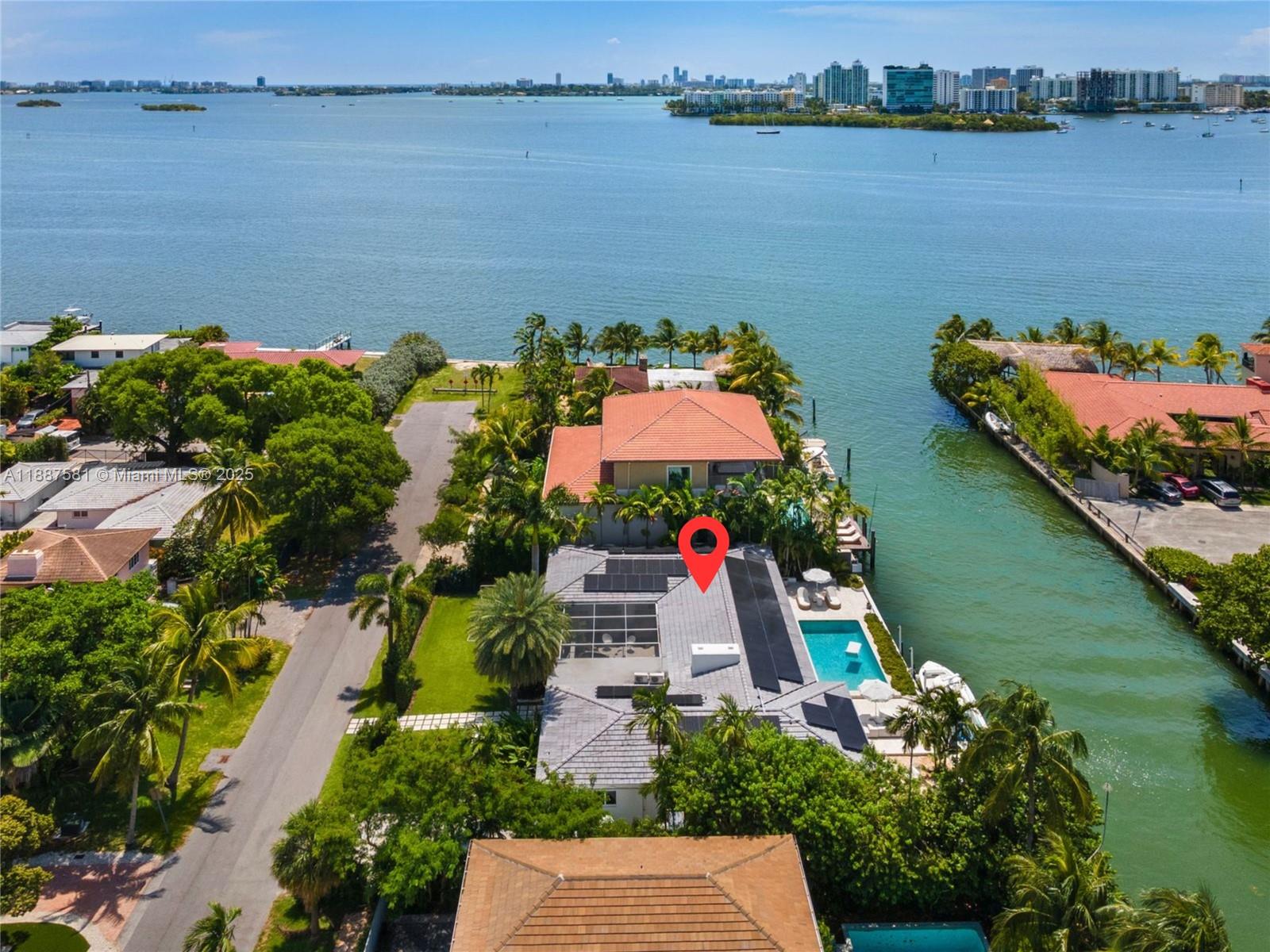 1250 Northeast 87th Street Miami, FL 33138 - Photo 49 of 53 an aerial view of a house with a lake view