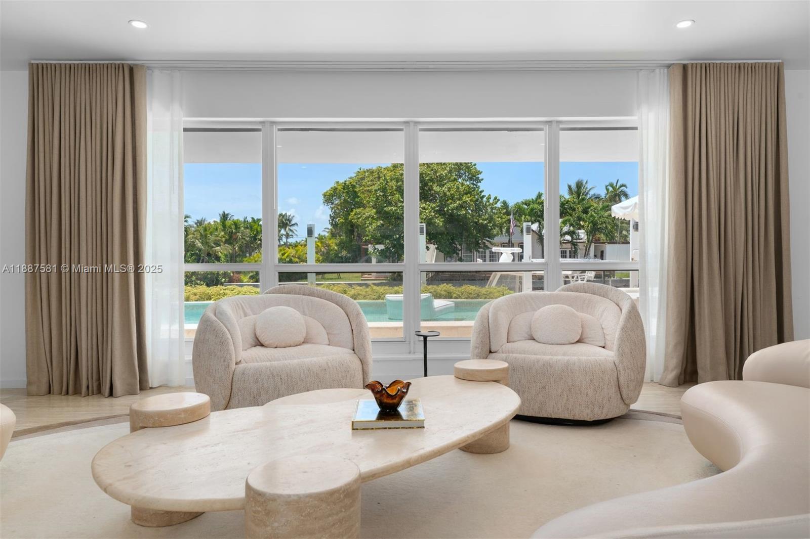 1250 Northeast 87th Street Miami, FL 33138 - Photo 9 of 53 a living room with furniture and a large window