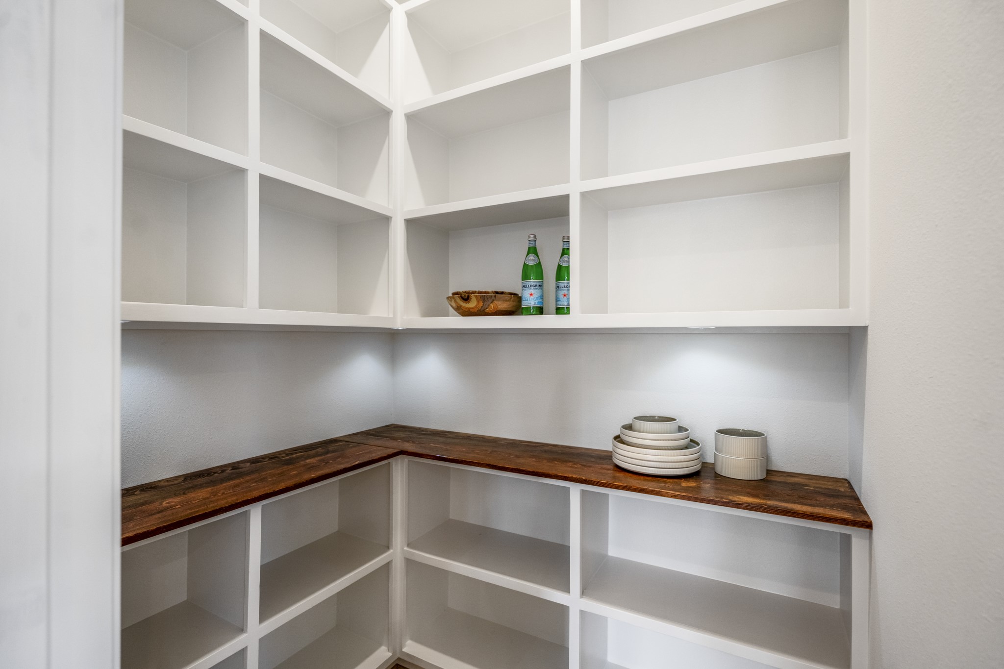 4101 East Rogers Street Houston, TX 77022 - Photo 13 of 42 a view of decorative items sitting on a shelf