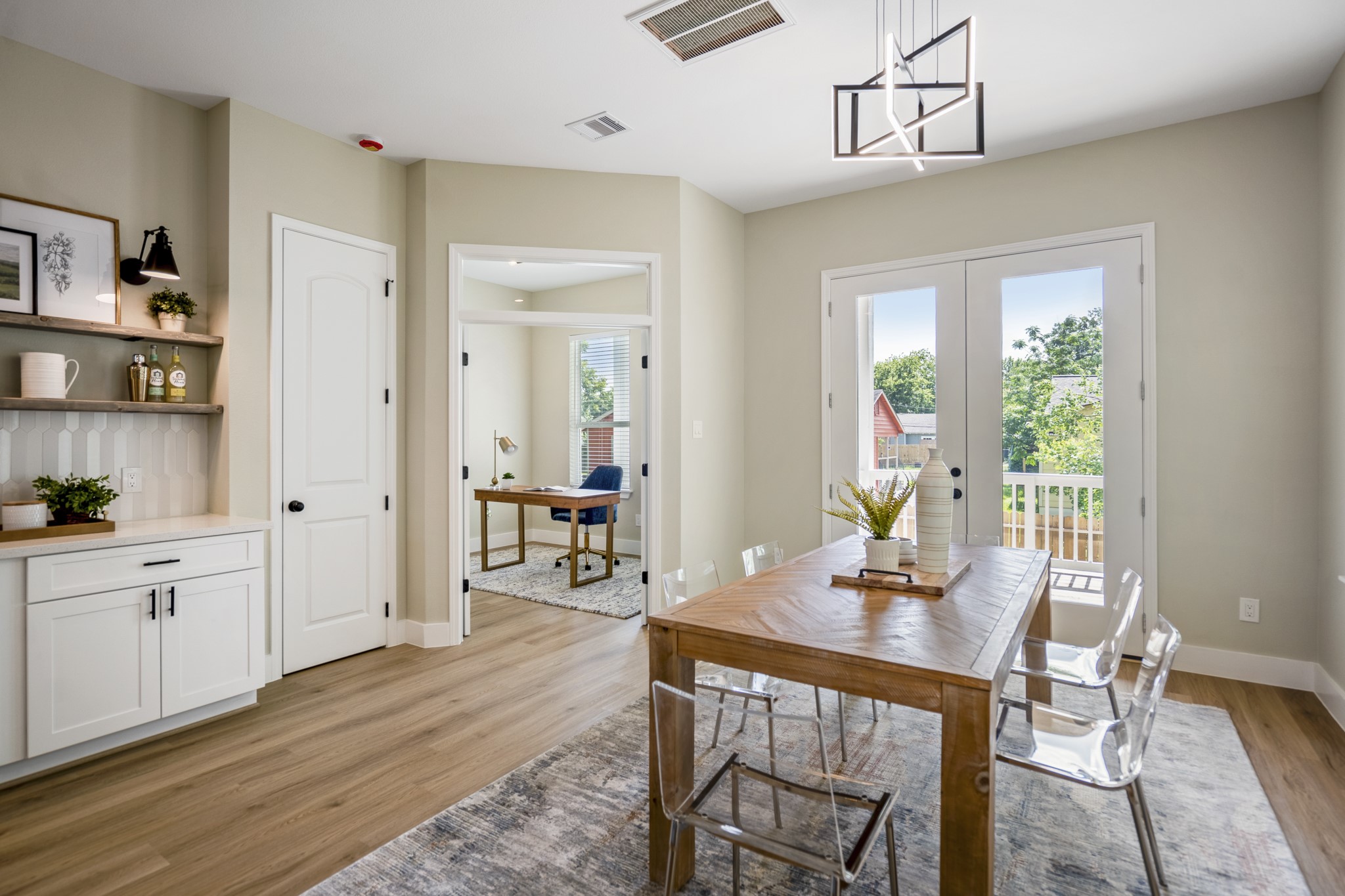 4101 East Rogers Street Houston, TX 77022 - Photo 16 of 42 a view of a dining room with furniture window and wooden floor