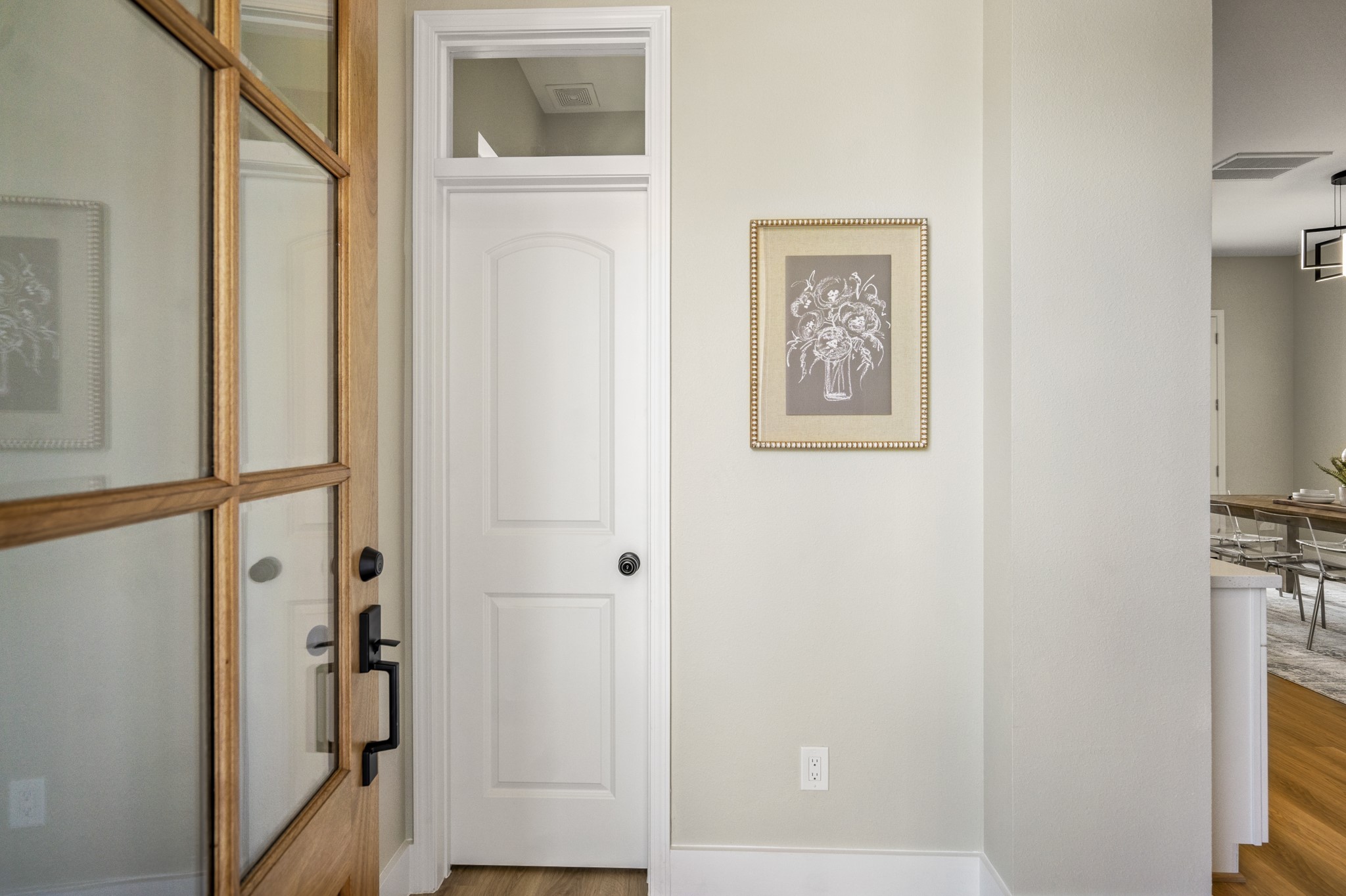 4101 East Rogers Street Houston, TX 77022 - Photo 5 of 42 a view of a hallway with wooden floor and entryway