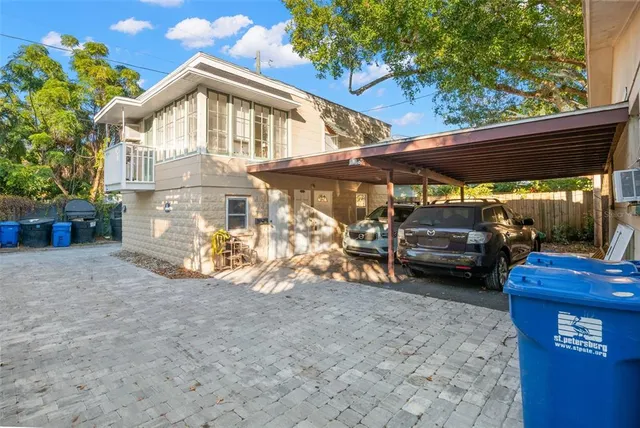 a view of a car park in front of house