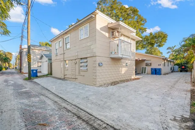 a view of a house with a street