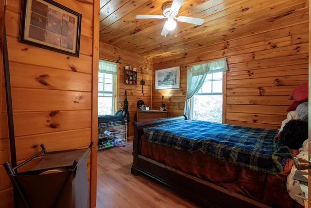 a view of a backyard with sitting area