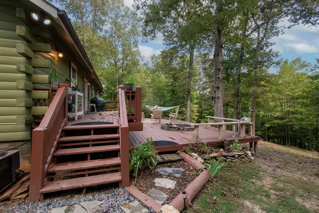 a view of a house with chair and wooden floor