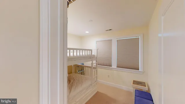 a view of a hallway with stairs