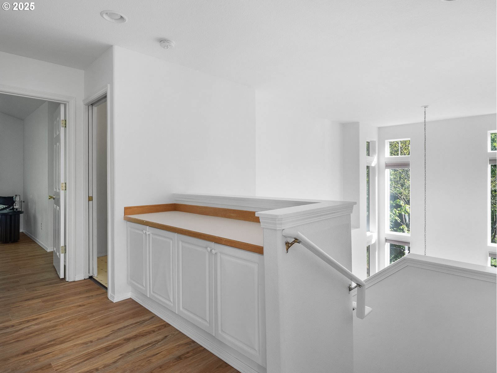68 Southeast 47th Circle Gresham, OR 97080 - Photo 14 of 30 a view of an entryway with wooden floor