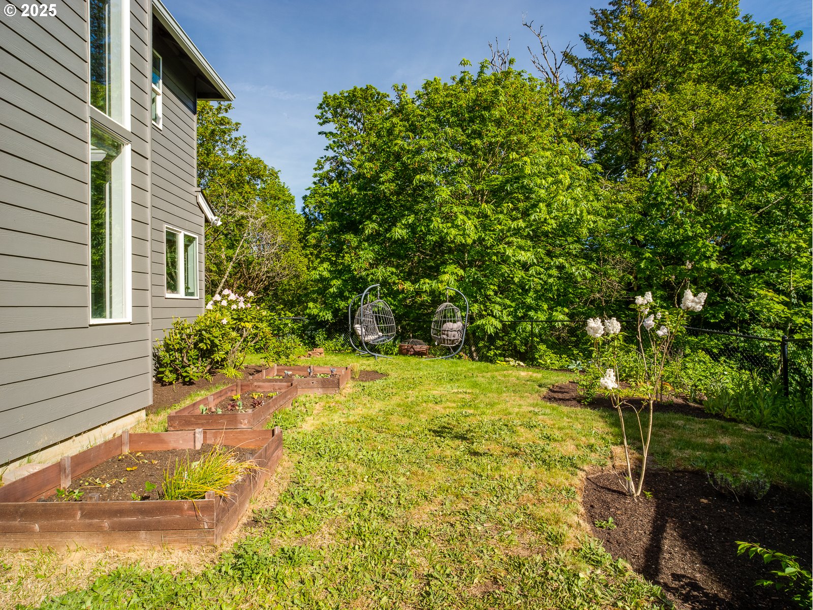 68 Southeast 47th Circle Gresham, OR 97080 - Photo 27 of 30 a backyard of a house with lots of green space