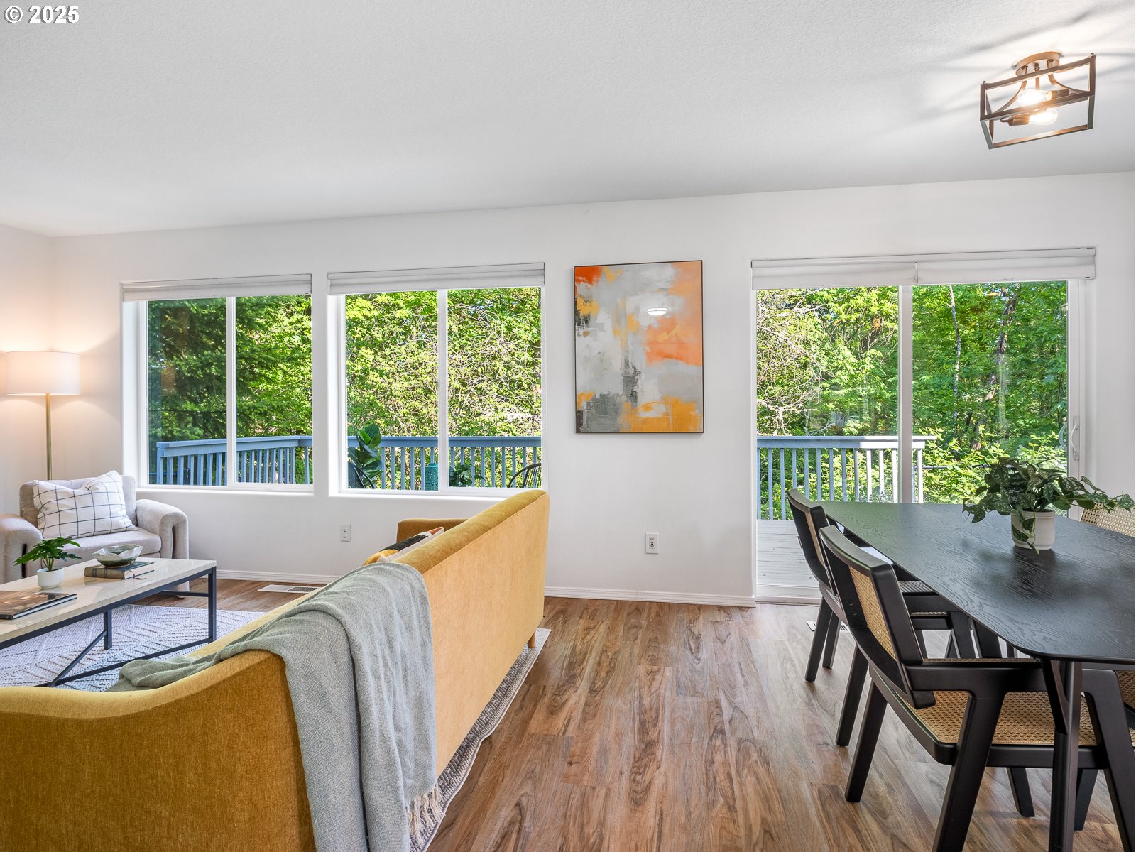 68 Southeast 47th Circle Gresham, OR 97080 - Photo 5 of 30 a living room with furniture and a large window