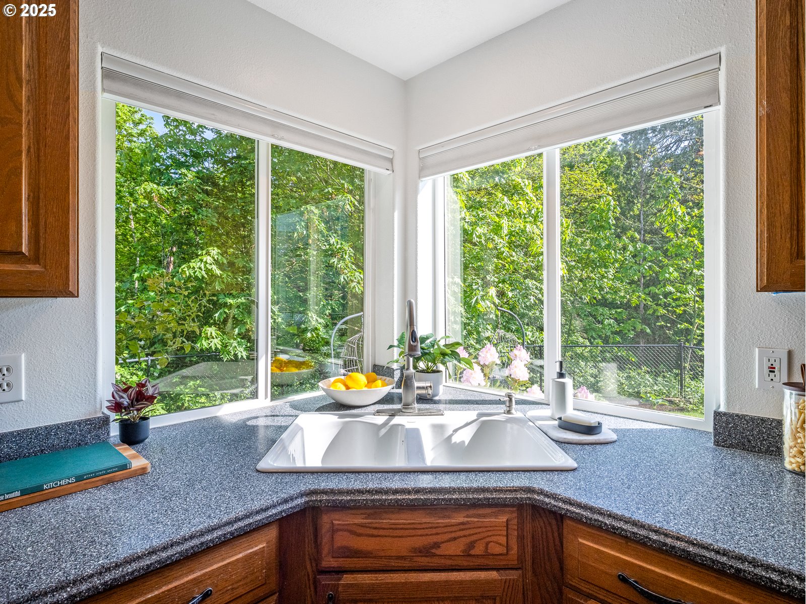 68 Southeast 47th Circle Gresham, OR 97080 - Photo 9 of 30 a kitchen with a large window and a sink