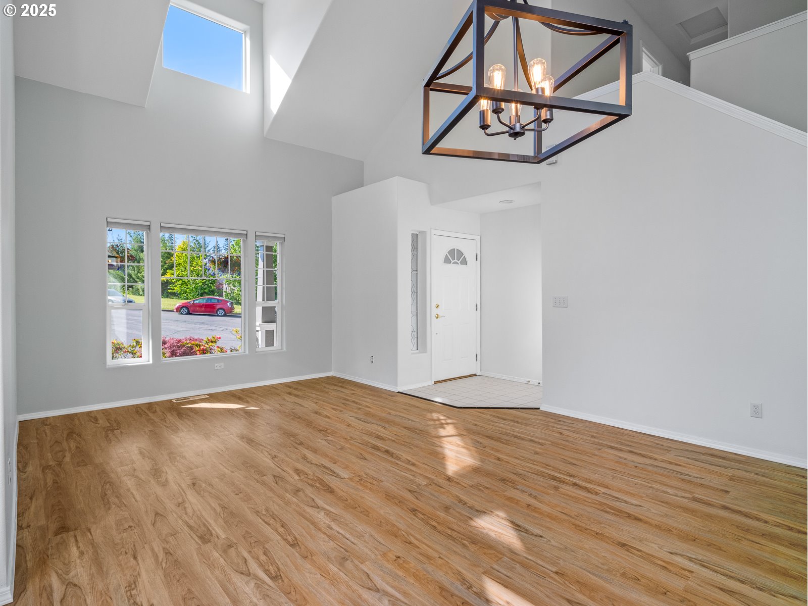 68 Southeast 47th Circle Gresham, OR 97080 - Photo 10 of 30 a view of an empty room with a window and a ceiling fan