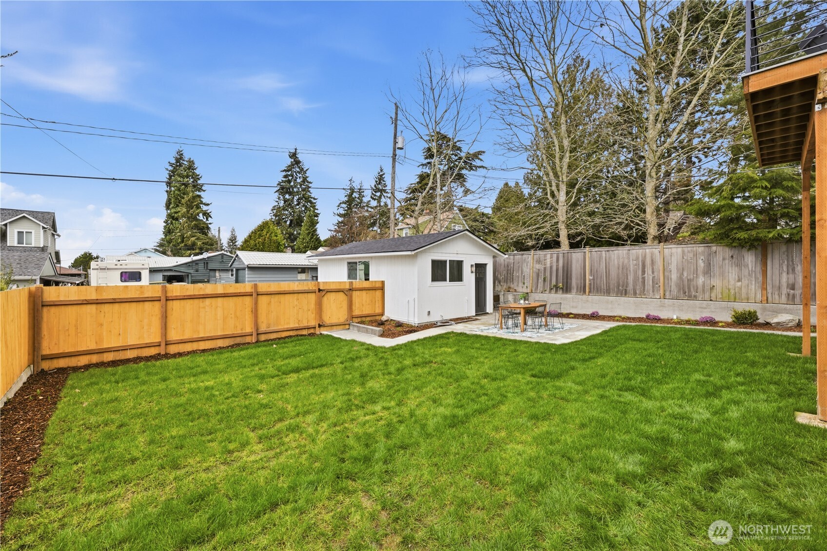 9011 36th Avenue Southwest Seattle, WA 98126 - Photo 38 of 40 a view of backyard with swimming pool and seating space