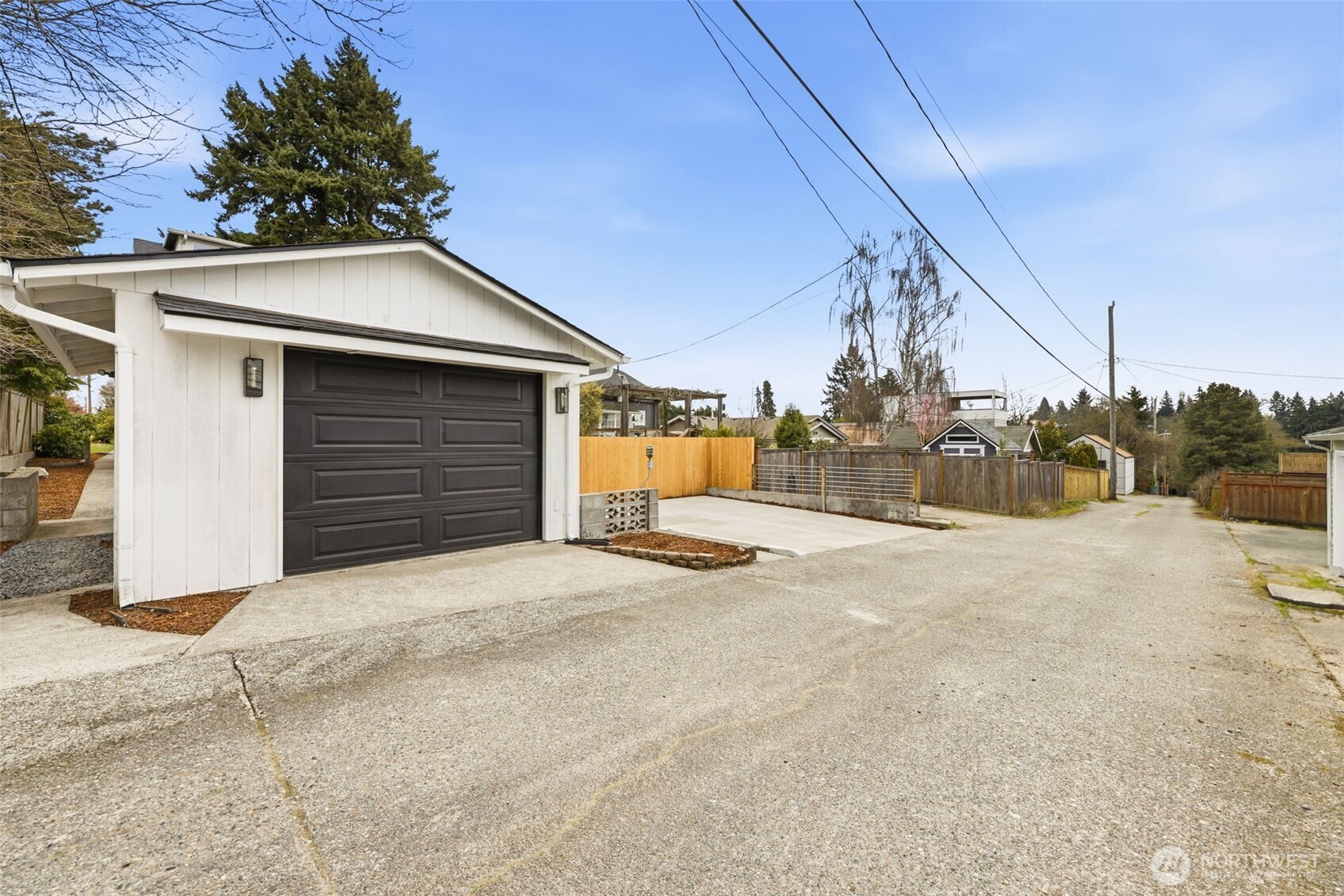 9011 36th Avenue Southwest Seattle, WA 98126 - Photo 40 of 40 a view of garage and yard