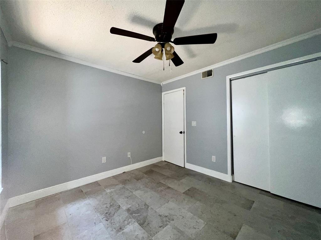 3964 Dream Oak Place, Unit 104 Tampa, FL 33613 - Photo 7 of 11 a view of an empty room