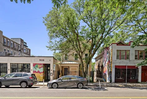 a car parked in front of a building