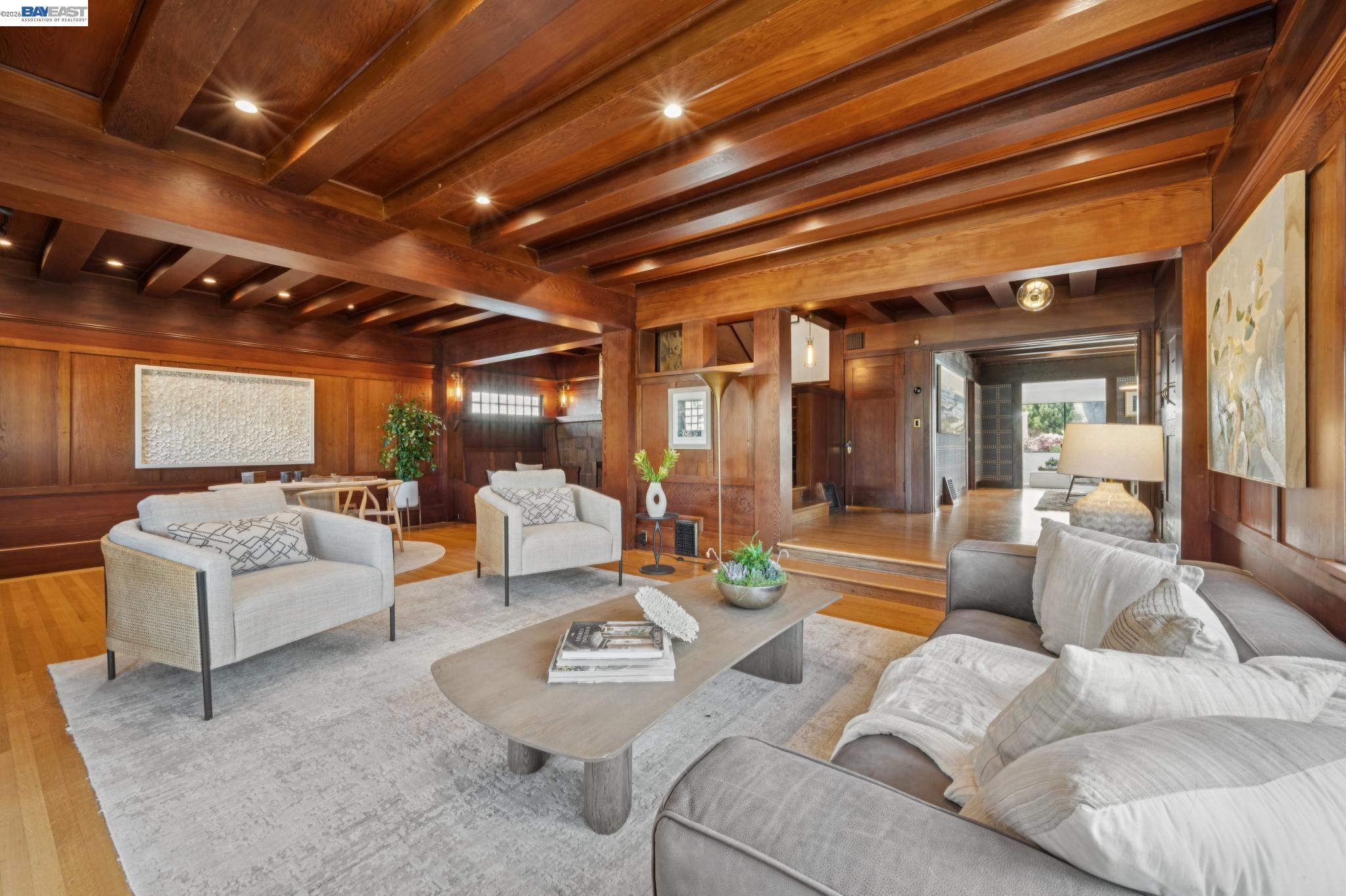 1122 Bay Street Alameda, CA 94501 - Photo 13 of 60 a living room with furniture and a chandelier