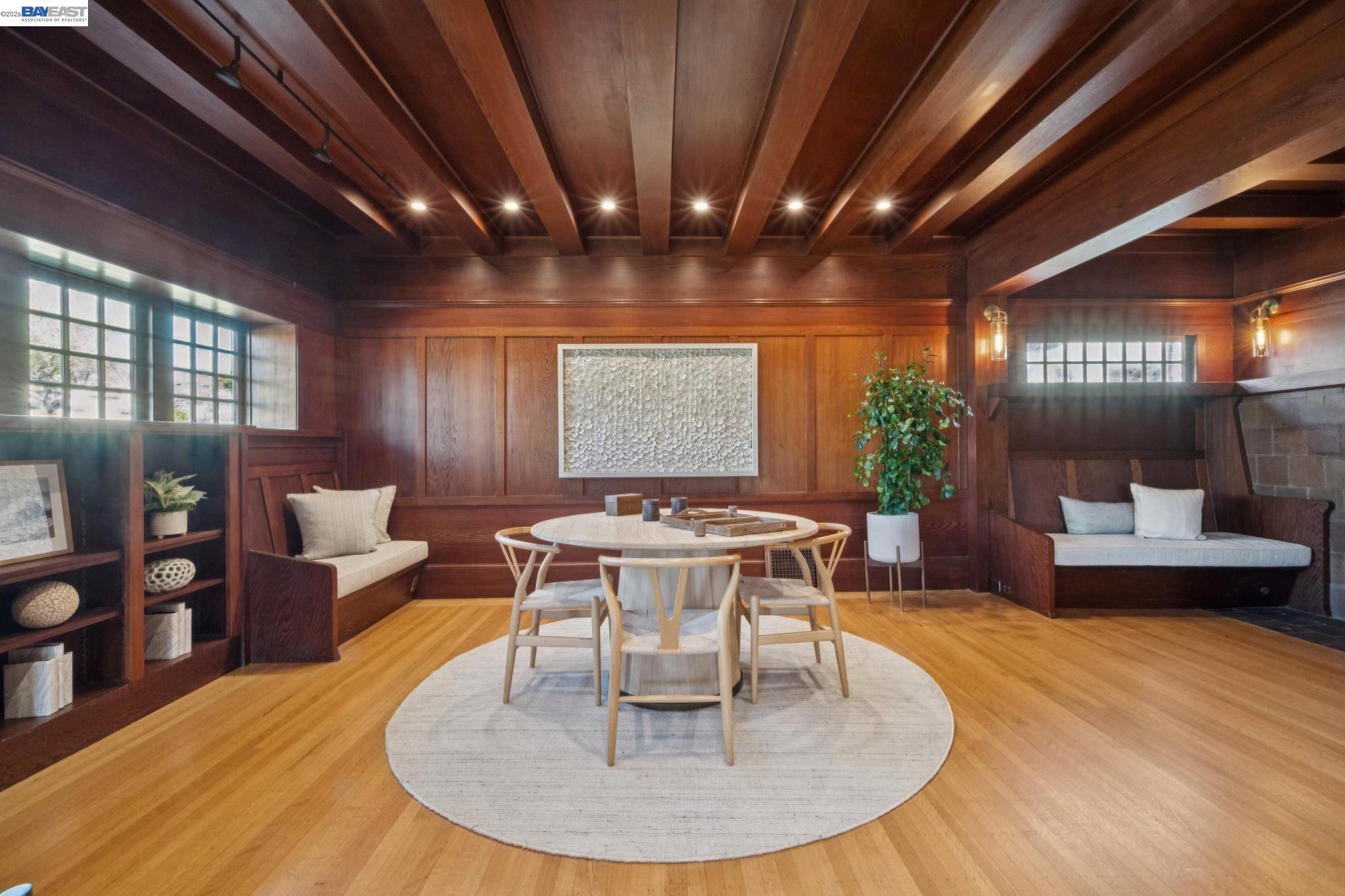 1122 Bay Street Alameda, CA 94501 - Photo 14 of 60 a dining room with furniture a chandelier and wooden floor