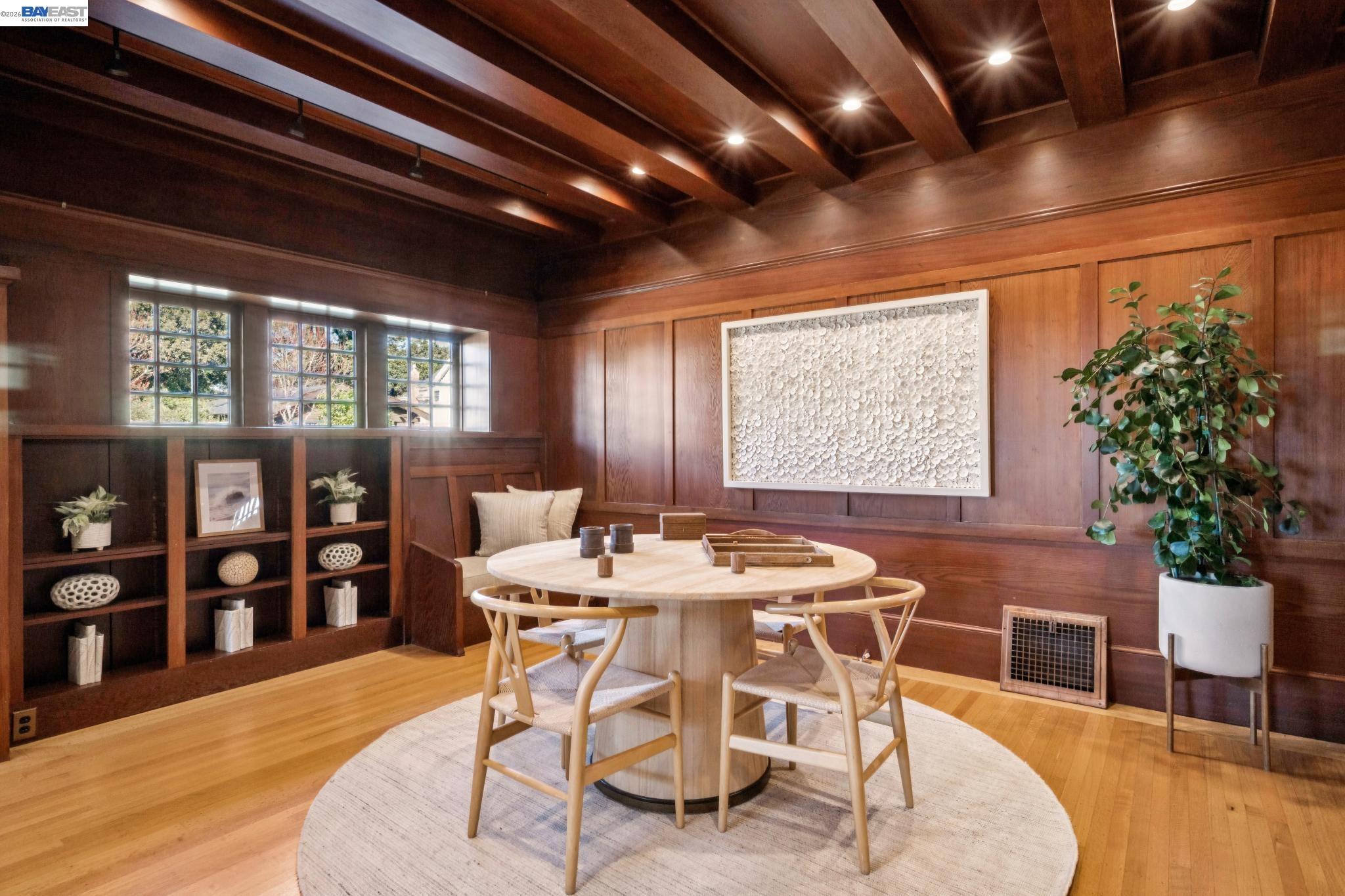 1122 Bay Street Alameda, CA 94501 - Photo 18 of 60 a dining room with furniture a rug and wooden floor