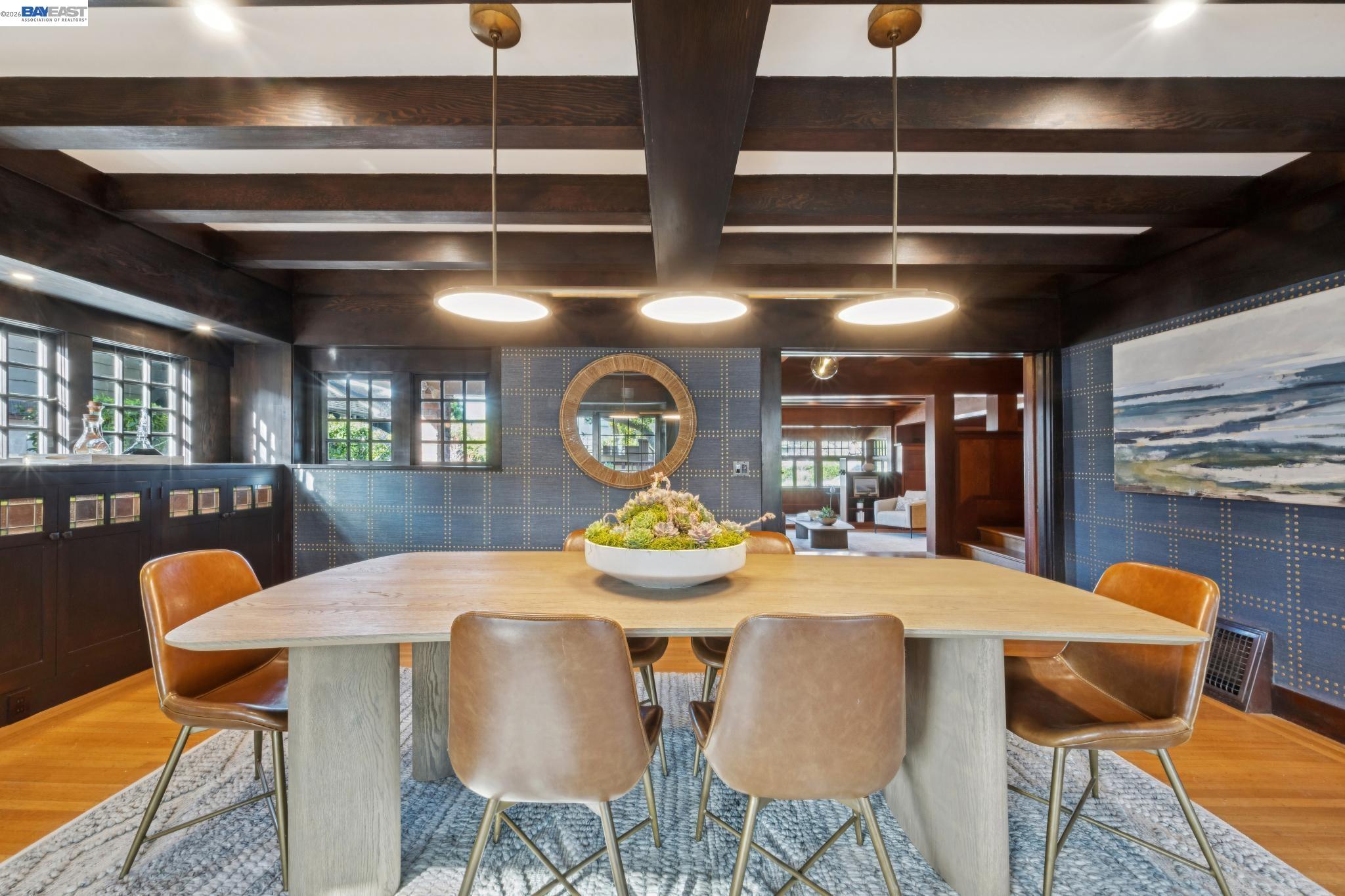 1122 Bay Street Alameda, CA 94501 - Photo 22 of 60 a dining room with furniture and chandelier