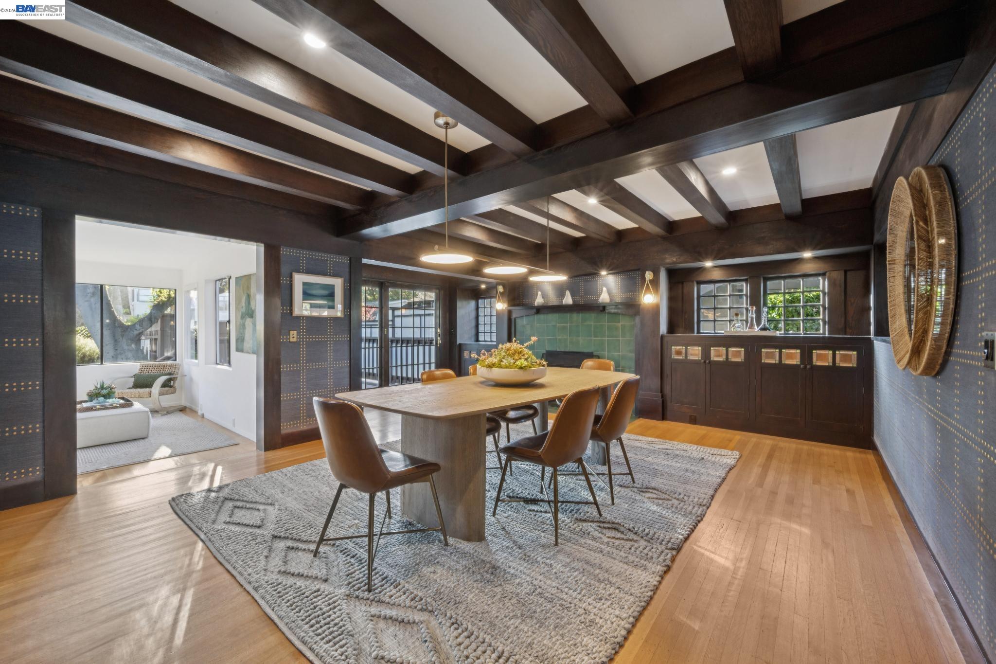 1122 Bay Street Alameda, CA 94501 - Photo 24 of 60 a dining room with furniture a chandelier and wooden floor