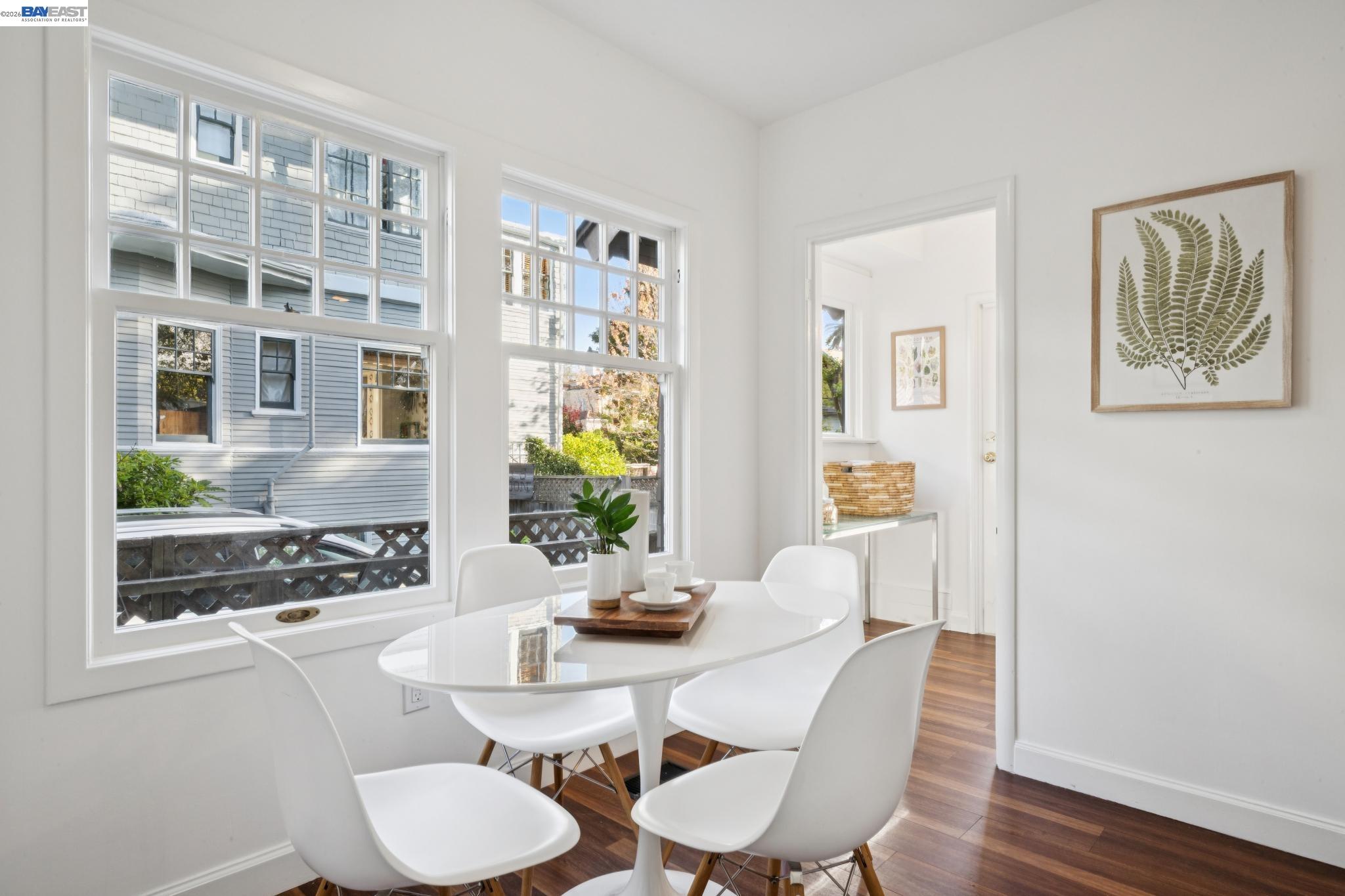 1122 Bay Street Alameda, CA 94501 - Photo 30 of 60 a view of a dining room with furniture and wooden floor