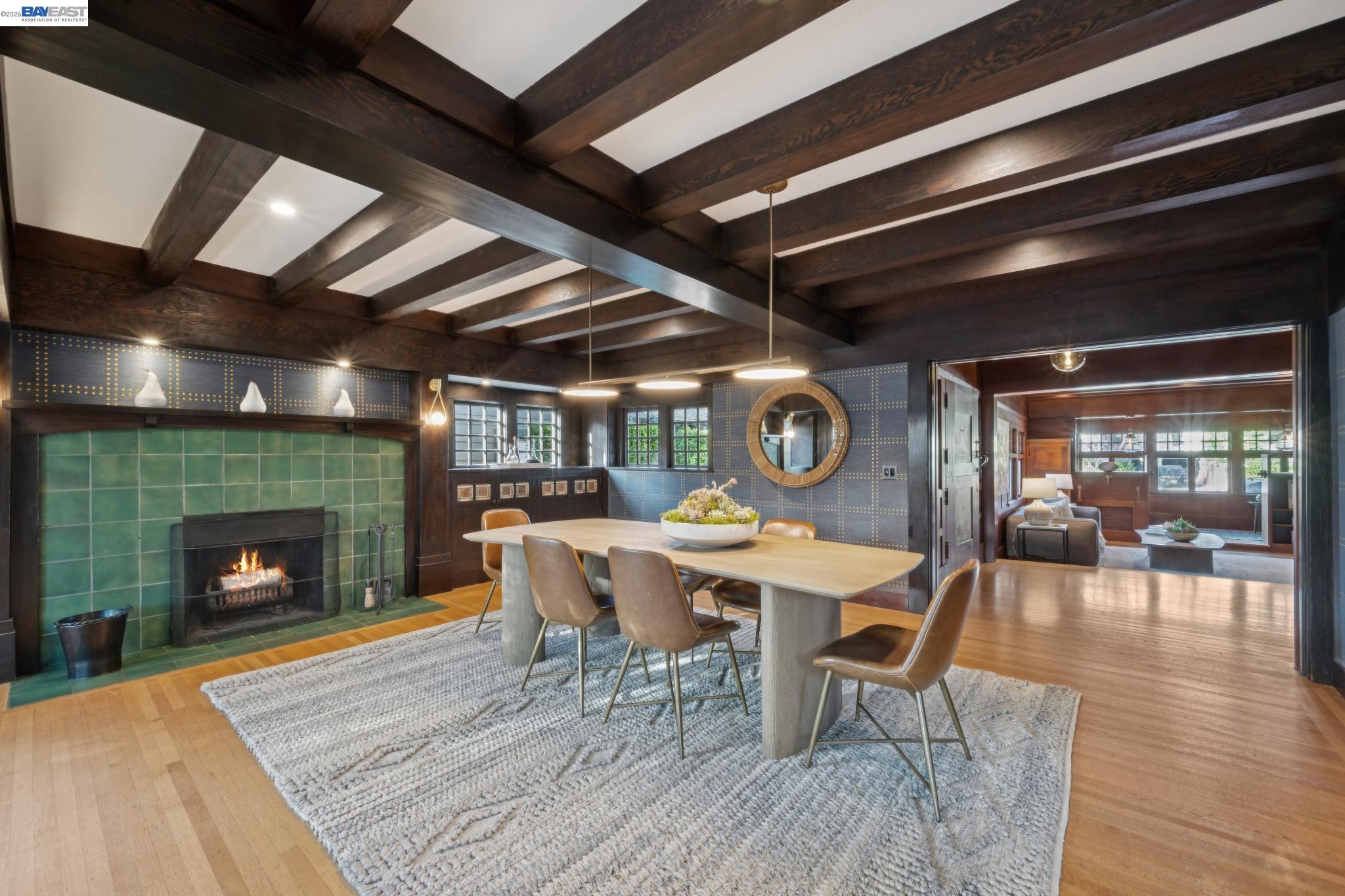 1122 Bay Street Alameda, CA 94501 - Photo 4 of 60 a dining room with furniture wooden floor fire place and an entrance