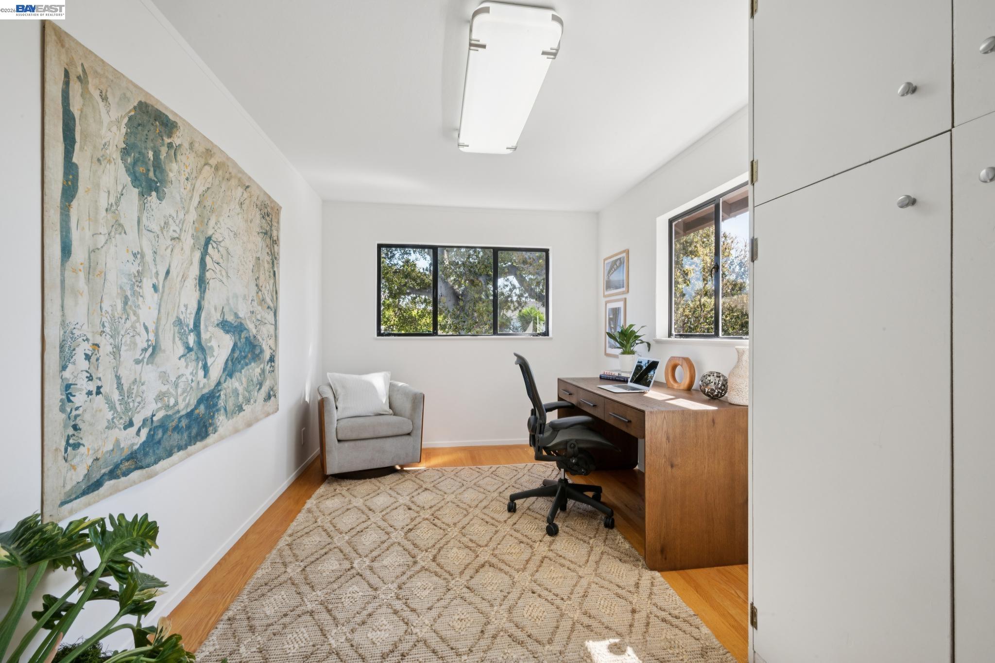 1122 Bay Street Alameda, CA 94501 - Photo 41 of 60 a view of a workspace with furniture and a window