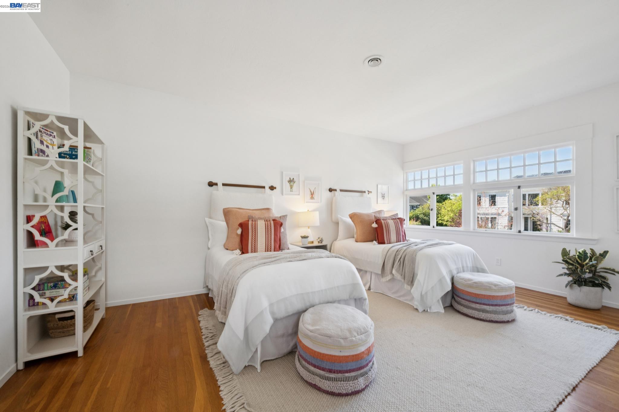 1122 Bay Street Alameda, CA 94501 - Photo 47 of 60 a bedroom with two beds and a wooden floor