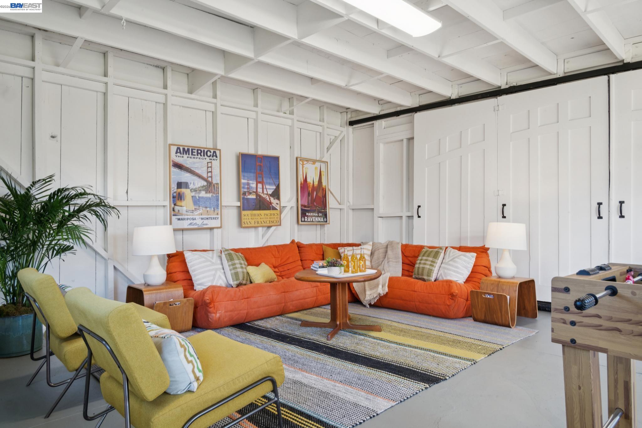 1122 Bay Street Alameda, CA 94501 - Photo 57 of 60 a living room with furniture and a rug