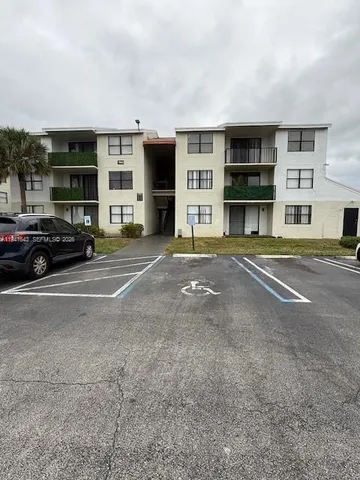 a car parked in front of a building