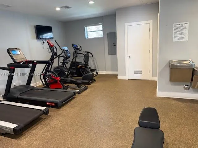 a view of a room with gym equipment