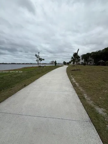 a view of a lake with a big yard