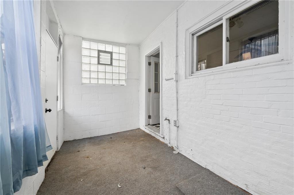 5154-5158 Natrona Way Pittsburgh, PA 15201 - Photo 11 of 46 an empty room with windows