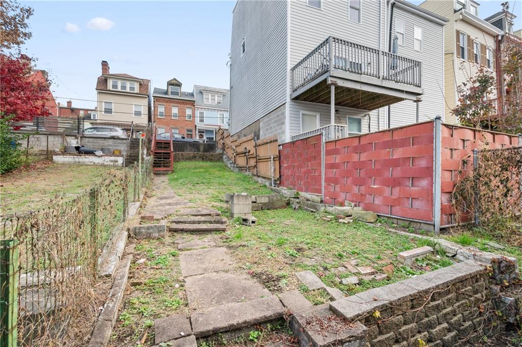 5154-5158 Natrona Way Pittsburgh, PA 15201 - Photo 18 of 46 a view of a backyard with plants