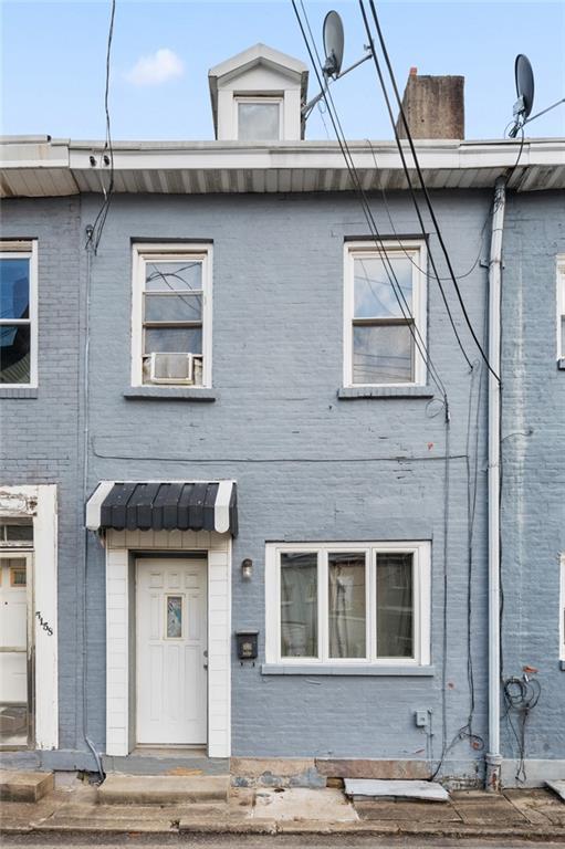 5154-5158 Natrona Way Pittsburgh, PA 15201 - Photo 21 of 46 a building with a clock on the wall