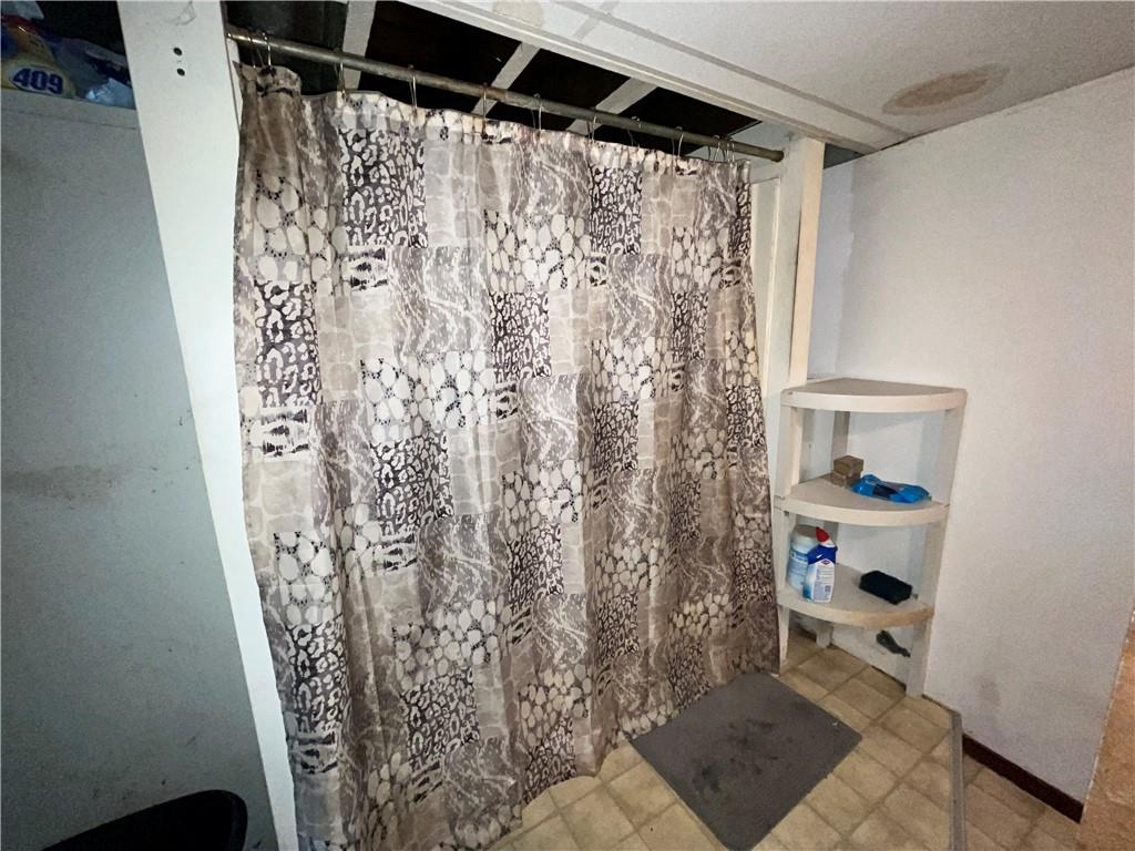 5154-5158 Natrona Way Pittsburgh, PA 15201 - Photo 27 of 46 a view of walk in closet with clothes and shoes