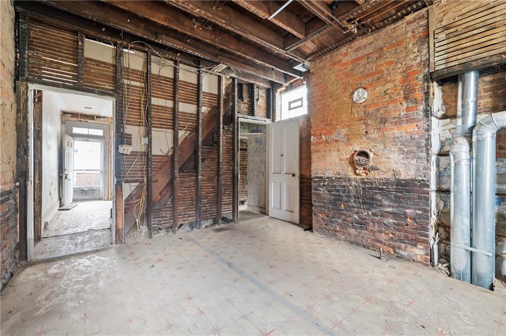 5154-5158 Natrona Way Pittsburgh, PA 15201 - Photo 37 of 46 a view of a room with an empty space and balcony