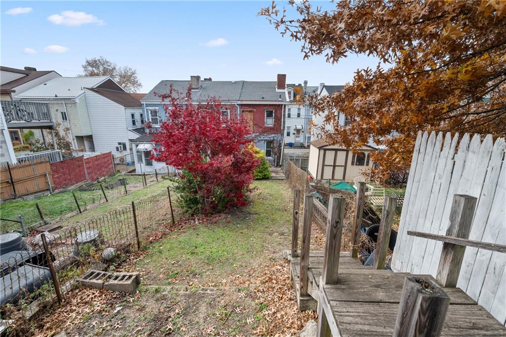 5154-5158 Natrona Way Pittsburgh, PA 15201 - Photo 46 of 46 a view of a house with backyard and garden