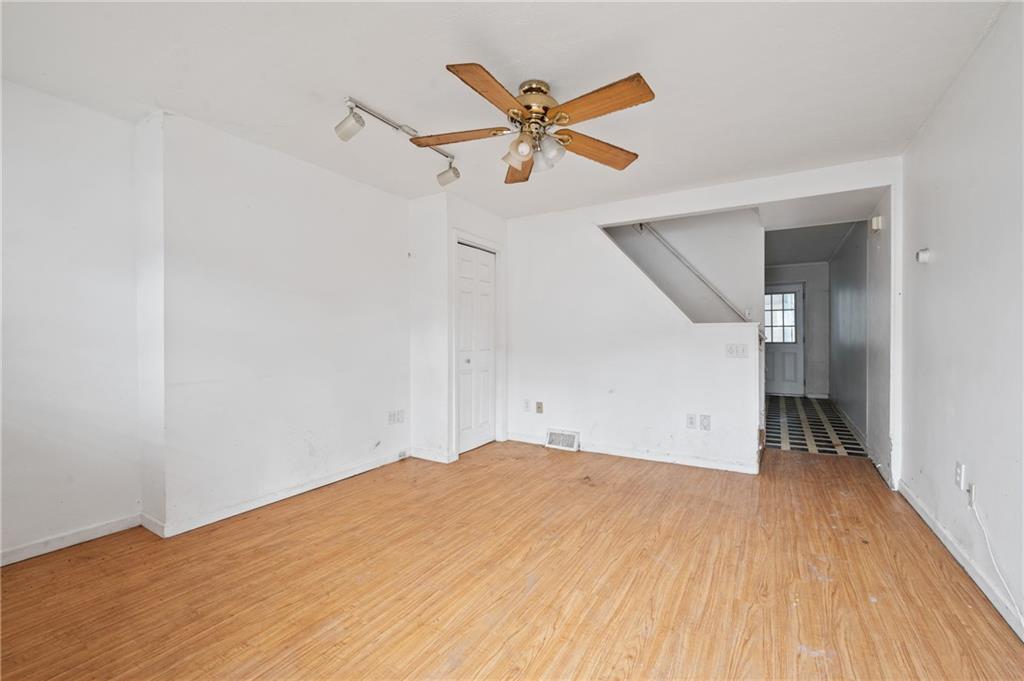 5154-5158 Natrona Way Pittsburgh, PA 15201 - Photo 9 of 46 a view of empty room with wooden floor