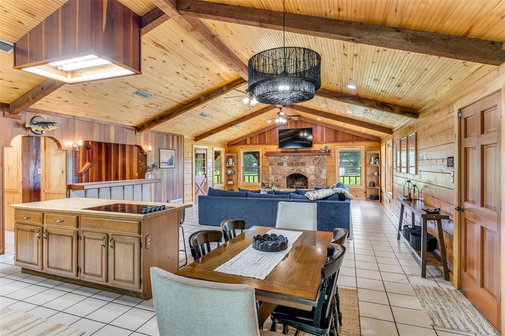 779 County Road 1971 Yantis, TX 75497 - Photo 14 of 40 a view of a dining room with furniture window and wooden floor
