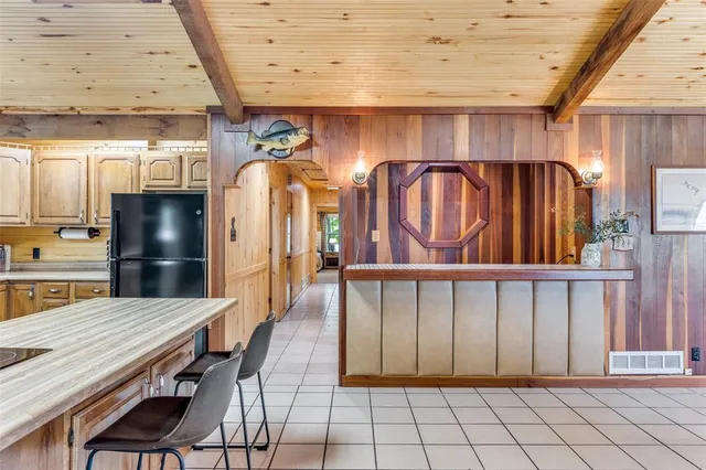 a view of kitchen with furniture and window