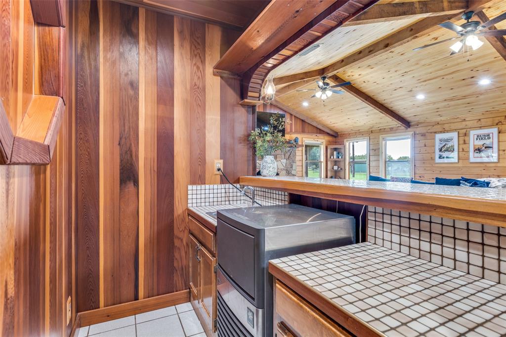 779 County Road 1971 Yantis, TX 75497 - Photo 20 of 40 a kitchen that has a sink and a stove