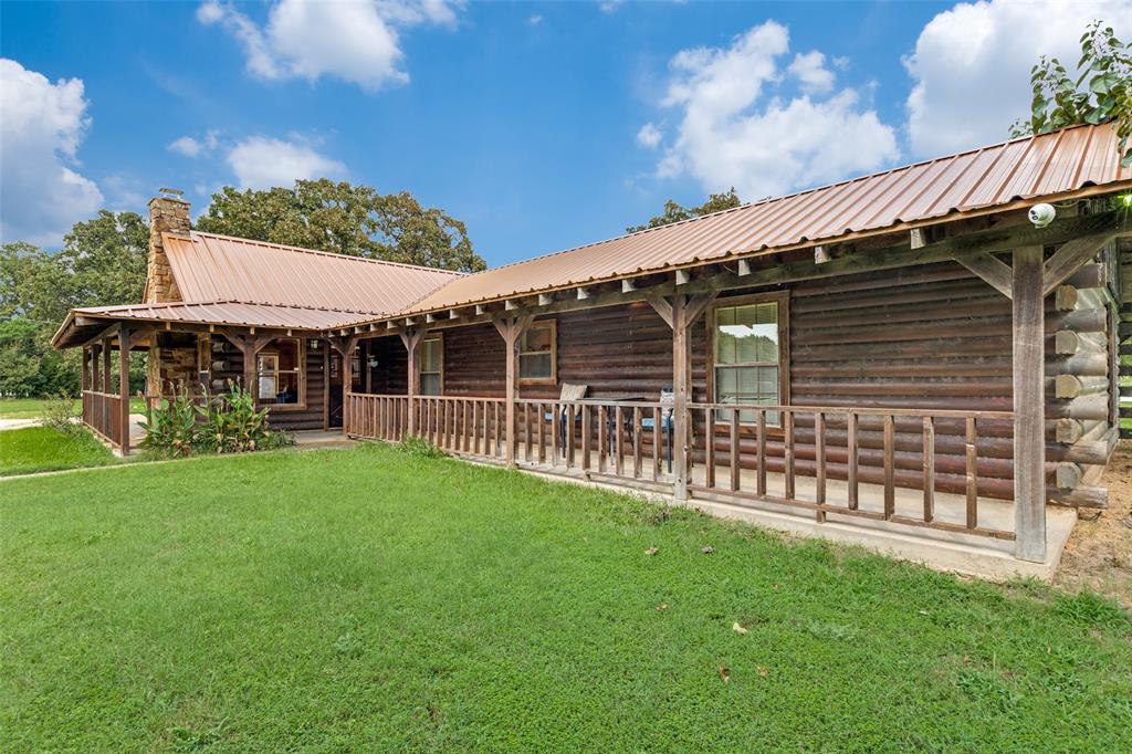 779 County Road 1971 Yantis, TX 75497 - Photo 6 of 40 a view of a house with a backyard