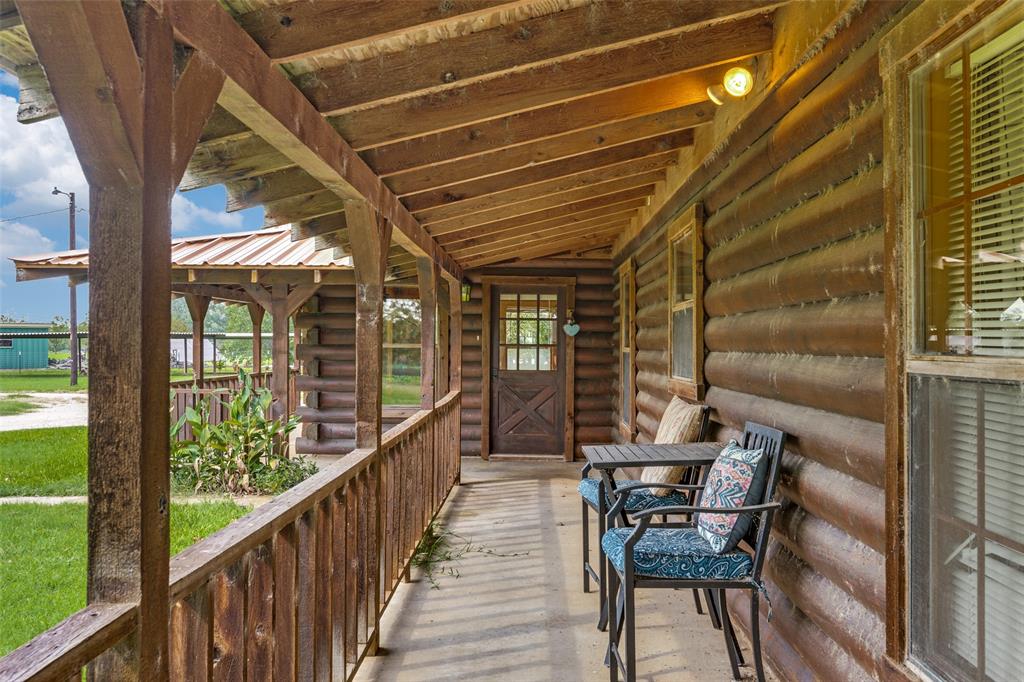 779 County Road 1971 Yantis, TX 75497 - Photo 7 of 40 a view of a balcony with chairs