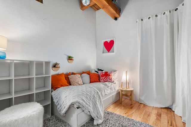 a bathroom with a sink a mirror a shower and a bathtub