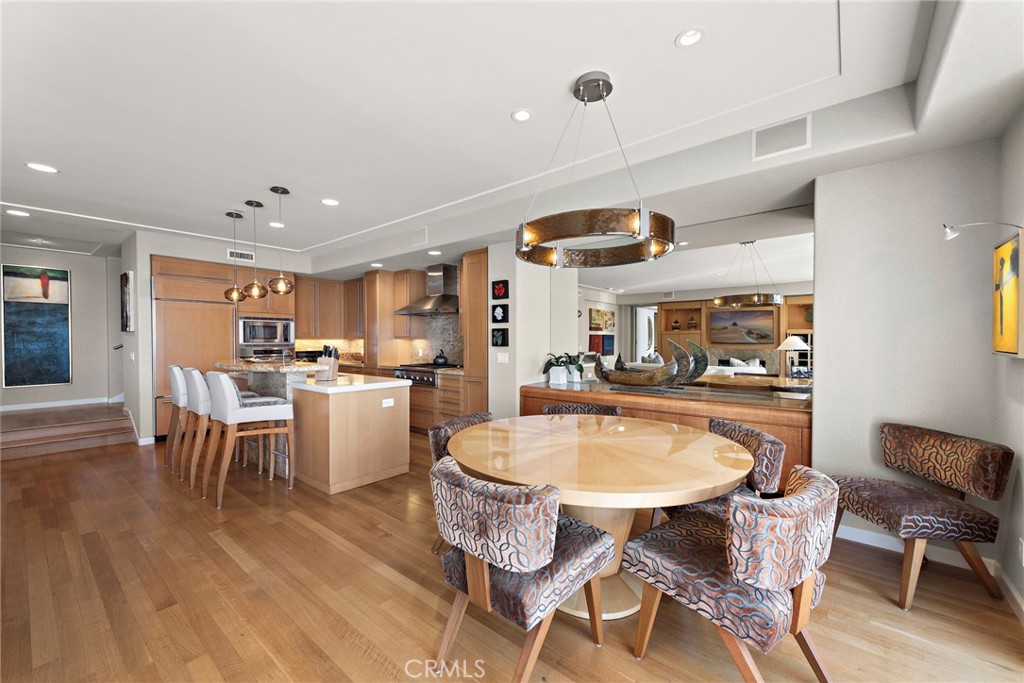 1603-1613 South Coast Highway, Unit F Laguna Beach, CA 92651 - Photo 11 of 38 Kitchen also boasts ample storage with custom cabinets, pull-out pantry doors, and extra built-ins in the dining area.