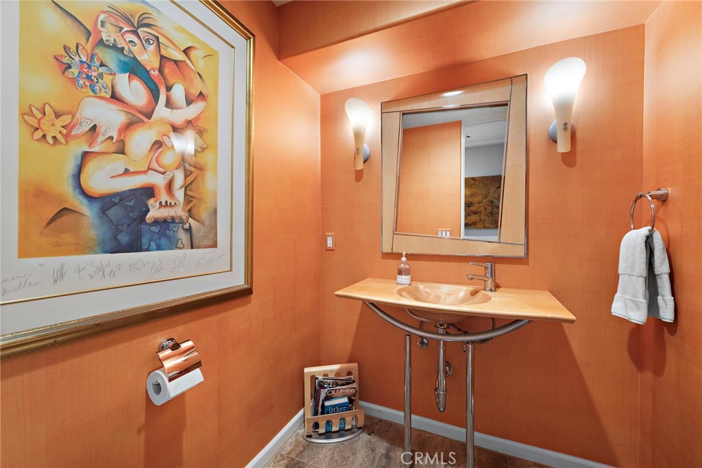 1603-1613 South Coast Highway, Unit F Laguna Beach, CA 92651 - Photo 14 of 38 Powder room located off the main living area for guests.