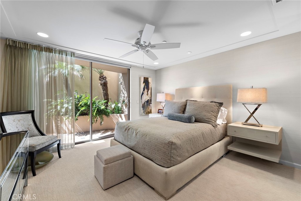 1603-1613 South Coast Highway, Unit F Laguna Beach, CA 92651 - Photo 20 of 38 One of two spacious guest bedrooms, both of which lead to the side yard that connect to the back deck.