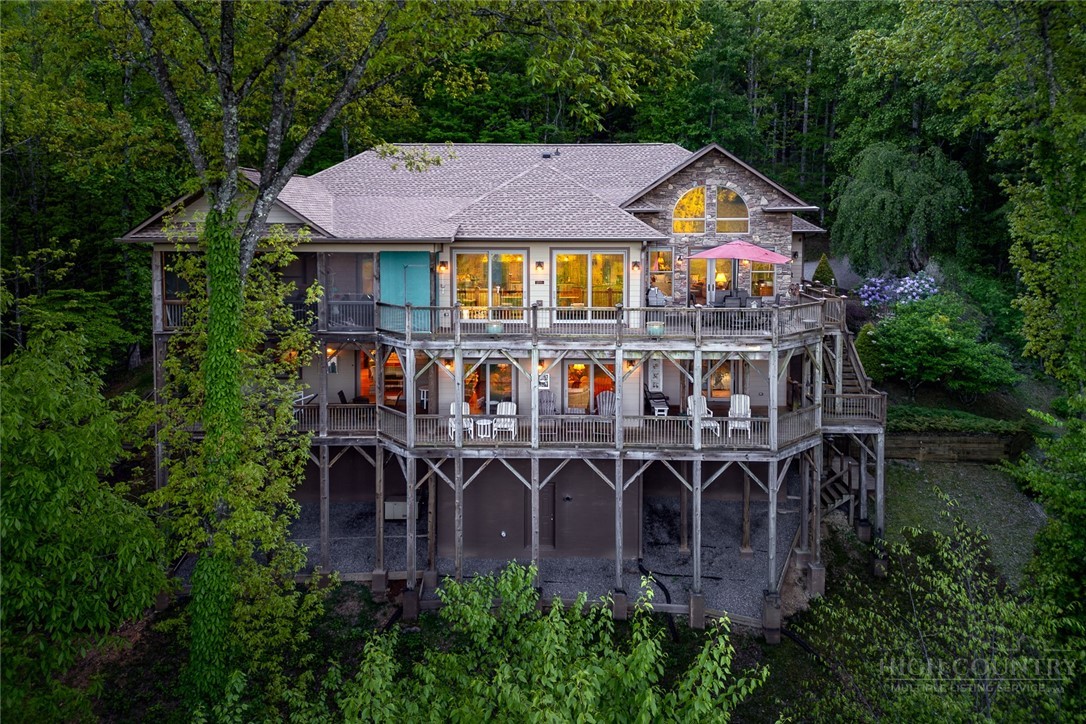 171 Camp Davis Road Banner Elk, NC 28604 - Photo 4 of 48 an aerial view of a house with garden space and sitting area